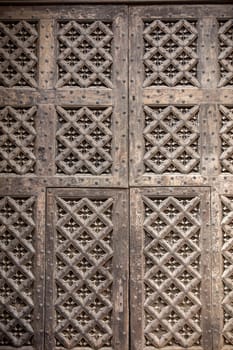 Old wooden door to St. Mary's Basilica in Gdansk. Poland