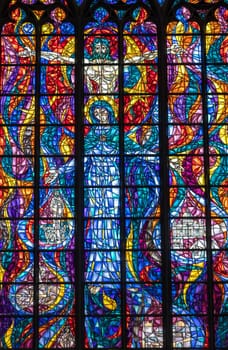 Gdansk, Poland - Sept 9, 2020:  A colorful stained glass window over the main altar in St. Mary’s Church (Basilica Mariacka) in Gdansk.