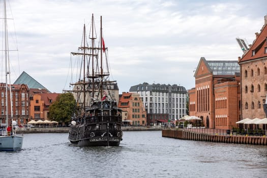 Gdansk, Poland - September 9, 2020: A replica of a galleon as a cruise ship on Motława River in old town of Gdansk