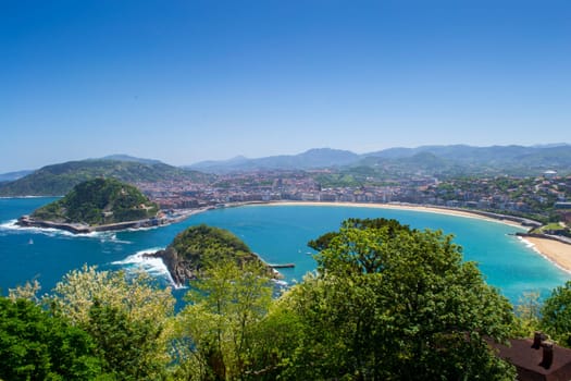 View on San Sebastian on a sunny day with clear sky. Travel and tourism in Spain