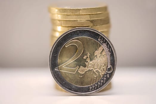 Two euro coins, close-up of a coin with the value of 2 euros.