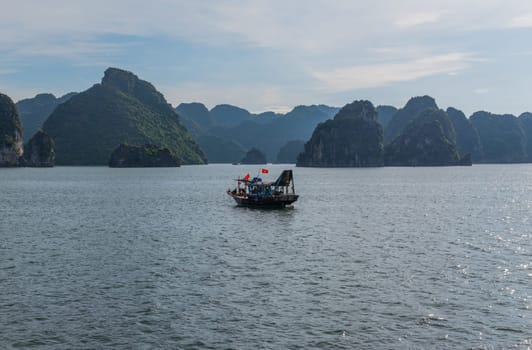 Halong Bay, Vietnam - July 17, 2022: boat in Halong Bay, Halong Bay is a Unesco world heritage site in Vietnem.