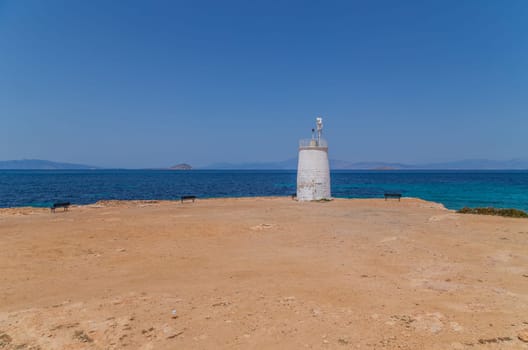 lighthouse of the Aegina island in Saronic gulf, Greece.