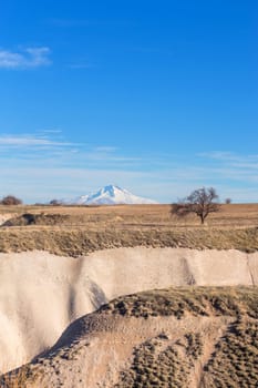 Volcanic cliffs and rock formations at Cappadocia, Anatolia. Turkey