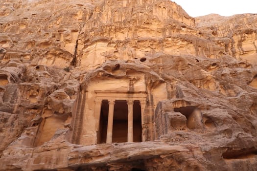Temple above cave rooms, little Petra, Siq al-barid, Petra, Jordan 2021