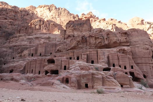 Walking along the street of facades in the ancien nabataean city of Petra, Jordan 2021