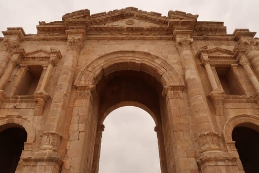 The imposing Arch of Hadrian, entrance gate to the ancient site of Gerasa, Jerash, Jordan 2021