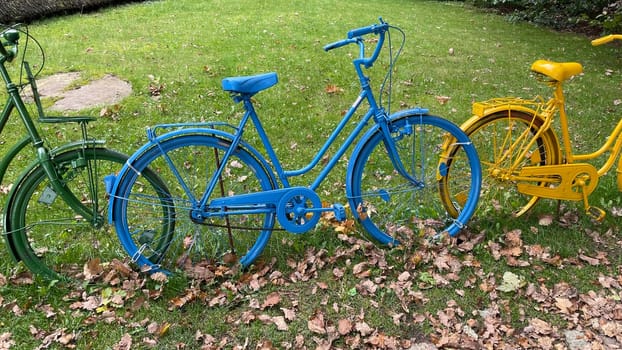 Colorful bicycles,also called ghost wheels,often stand on the roadside as a memorial wheel or as a work of art somewhere in nature. Colorful bicycles,also known as ghost bikes,are often found on the side of the road as a reminder wheel or as a work of art somewhere in nature.
