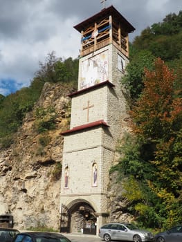 Mali Zvornik, Serbia, September 29, 2022 The Church of the Holy Cross, or Mali Ostrog, a place of worship in the rock was carved in a cave. The temple is in the shape of a cross, buried in the ground