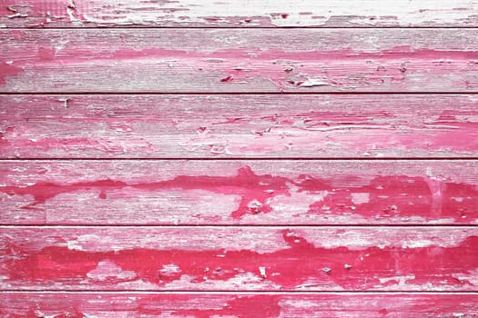 Painted red old wooden wall texture, rustic background..Peeling paint wood background.