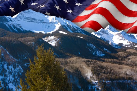 The American flag over the Rocky Mountains, Colorado.