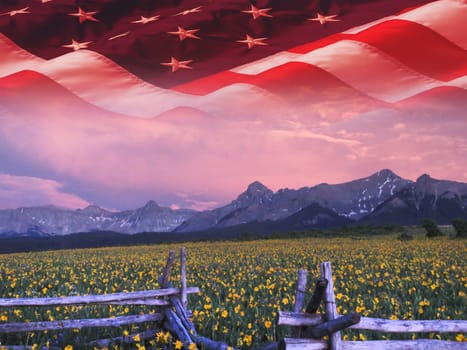 The American flag over the Rocky Mountains, Colorado.
