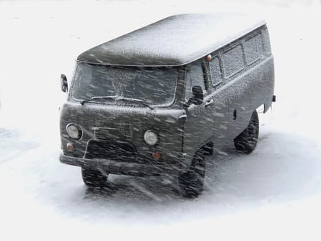 green military SUV in the snow in a blizzard