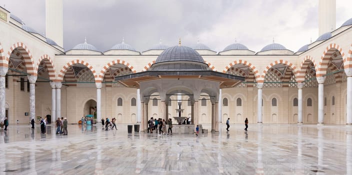 Istanbul, Turkey - September 1, 2022: Courtyard of Grand Camlia Mosque, or Buyuk Camlica Camii, a modern Islamic complex, built in 2019, with few pedestrians, located in Camlica hill, Uskudar