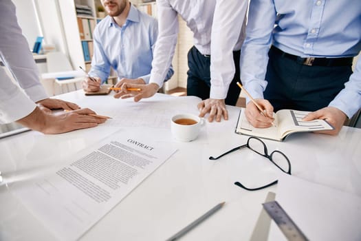 Group of architects during discussion of their work