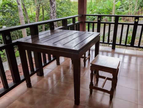 Wooden chair and table on terrace