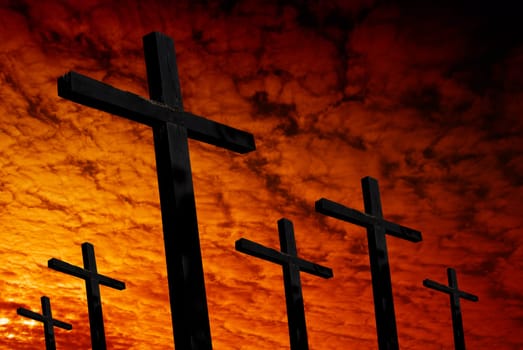 cross silhouette with the sunset as background