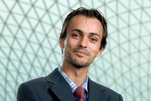 portrait of young man isolated at the office