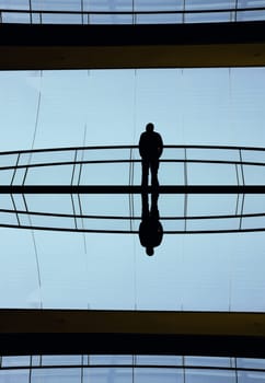 young man inside a modern office building