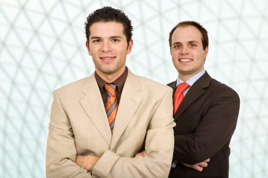 two young business men portrait at the office