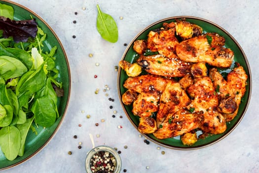 Baked chicken wings with sesame seeds. Chicken meat