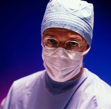 Questioning surgeon.