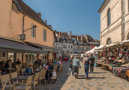 View of unidentified people on a street in Besancon, France