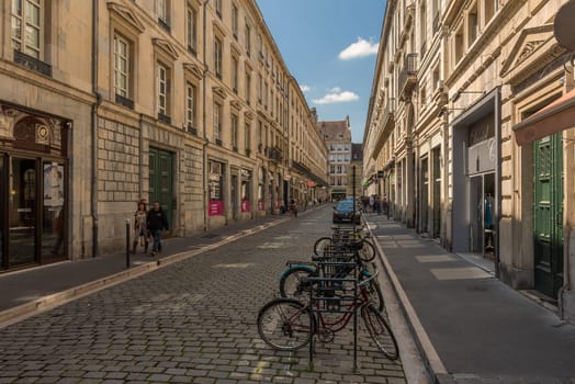 View of unidentified people on a street in Besancon, France