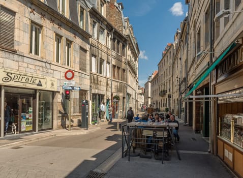 View of unidentified people on a street in Besancon, France