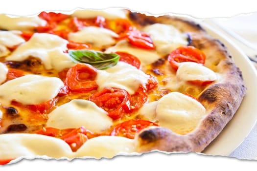 Creative picture of Pizza Margherita with Mozzarella cheese, basil and tomatoes