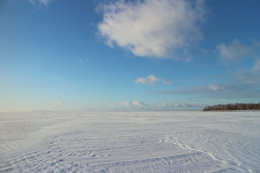 frozen lake covered with snow winter landscape