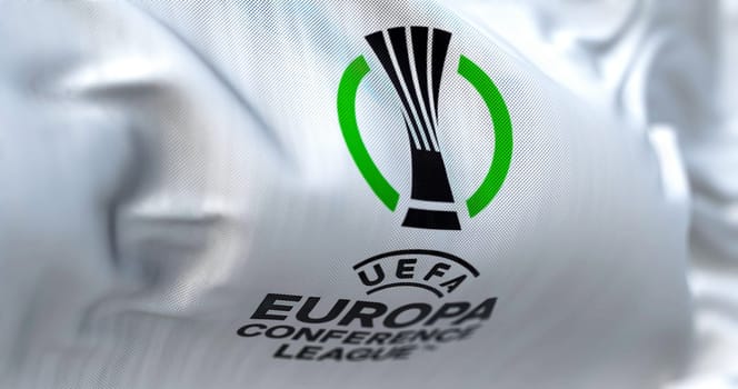 Prague, Czech Rep, July 2022: Close-up view of the UEFA Europa Conference League flag waving. Europa Conference League is an annual football club competition for european clubs. 3D illustration render