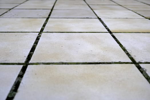 Tiled floor in urban street, construction and architecture