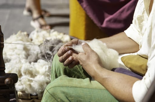 Detail of old tradition working with wool, handmade