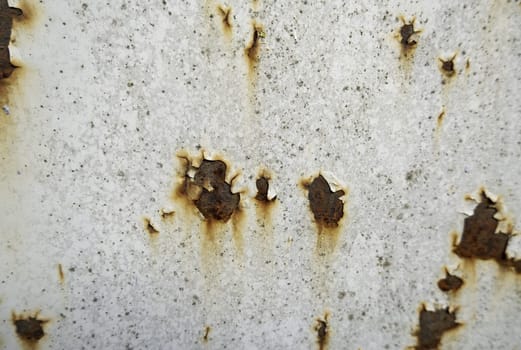 Detail of ruin and abandonment in a metal wall, rusty texture