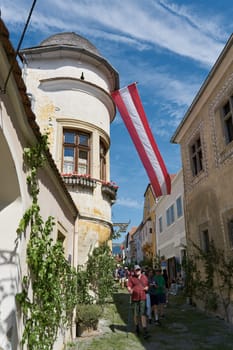 Tourists in the main street of the small town of Duernstein in the Wachau region of Austria