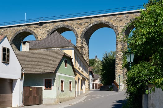 Emmersdorf in Austria with the viaduct as part of the railroad line of the Donauuferbahn from Sankt Valentin to Krems