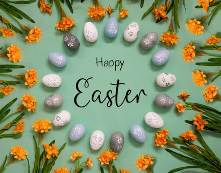 Flat Lay With English Text Happy Easter. Easter Egg Decoration With Orange Spring Flowers. Light Green Paper Background.