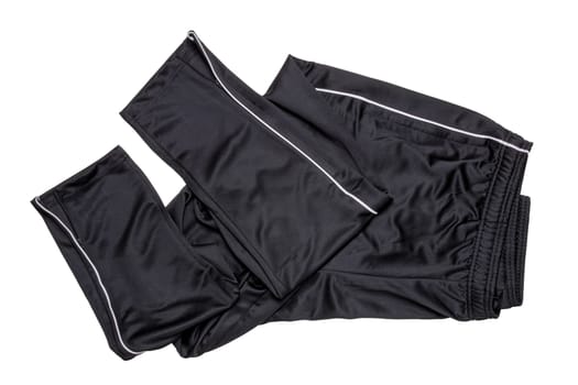 Sweat pants isolated. Closeup of mens fashionable black sweat pants or jersey trousers isolated on a white background. Clipping path. Outfit for workout.