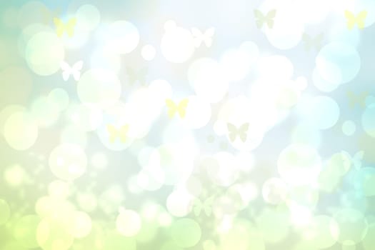 Hello spring background. Abstract delicate bright spring or summer landscape texture with natural green yellow white bokeh lights, sunshine and butterflies. Beautiful backdrop with space.