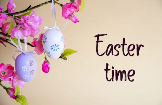 Beautiful Easter Egg Decoration With Spring Flowers. English Text Easter Time. Seasonal Easter Holiday Greeting Card.