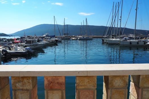 Meljine, Herceg Novi, Montenegro, August 13 2022 Boats, yachts and ships are at anchor. Moored ships in the parking lot. Adriatic Sea Mediterranean. Travel business. Sea travel and sports. Summertime