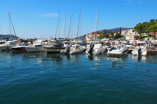 Meljine, Herceg Novi, Montenegro, August 13 2022 Boats, yachts and ships are at anchor. Moored ships in the parking lot. Adriatic Sea Mediterranean. Travel business. Sea travel and sports. Summertime