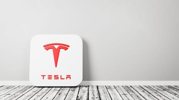 Tesla App Icon 3D Symbol Shape on Wooden Floor Against Gray Wall with Copy Space 3D Render Illustration