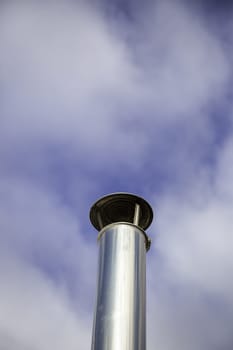 Detail of metal smoke extraction tube in the city