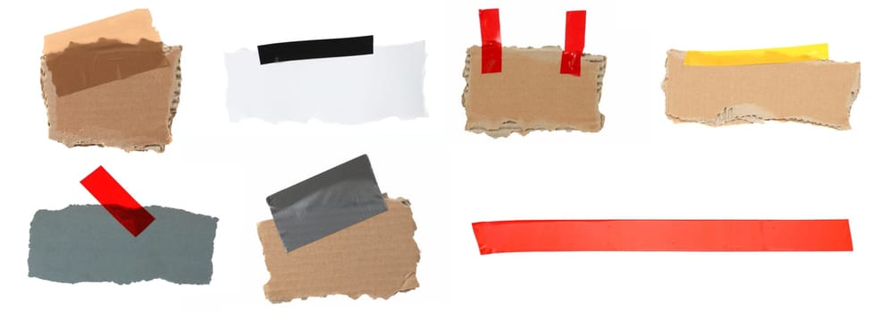 Collection of cardboards and paper with adhesive tape