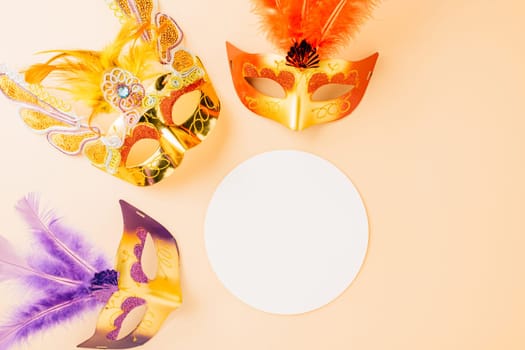Happy Purim carnival decoration. Top view venetian ball mask with feather isolated on pastel background white paper circle, Masquerade party, Jewish Purim in Hebrew, holiday background banner design