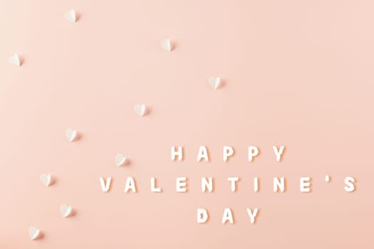 Happy Valentines Day background. Top view flat lay of paper elements cutting white hearts shape flying on pink background with copy space, Happy Mother's Day, Banner template design of holiday