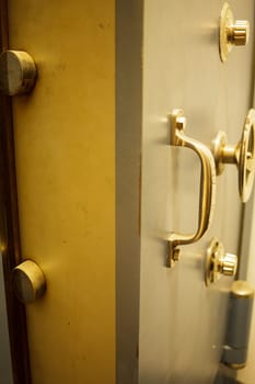 Close-up of an old bank safe with combination lock
