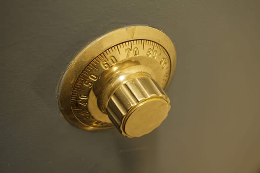 Close-up of an old bank safe with combination lock